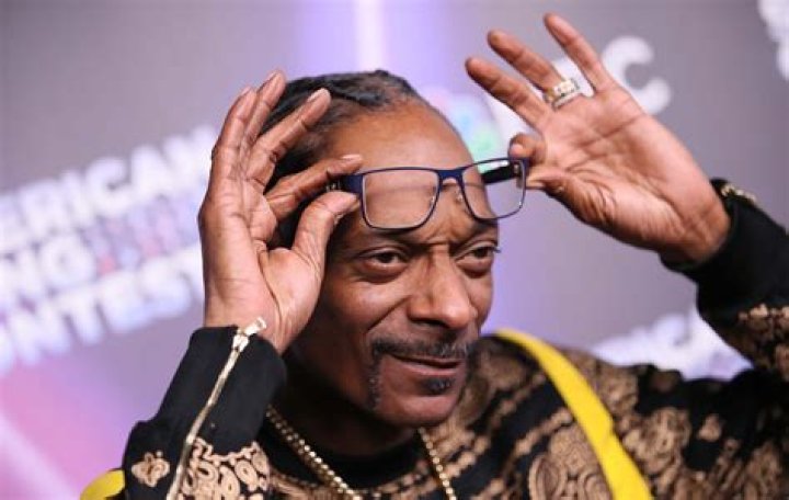 How rich is Snoop Dogg’s baby mama Laurie Holmond? Net worth